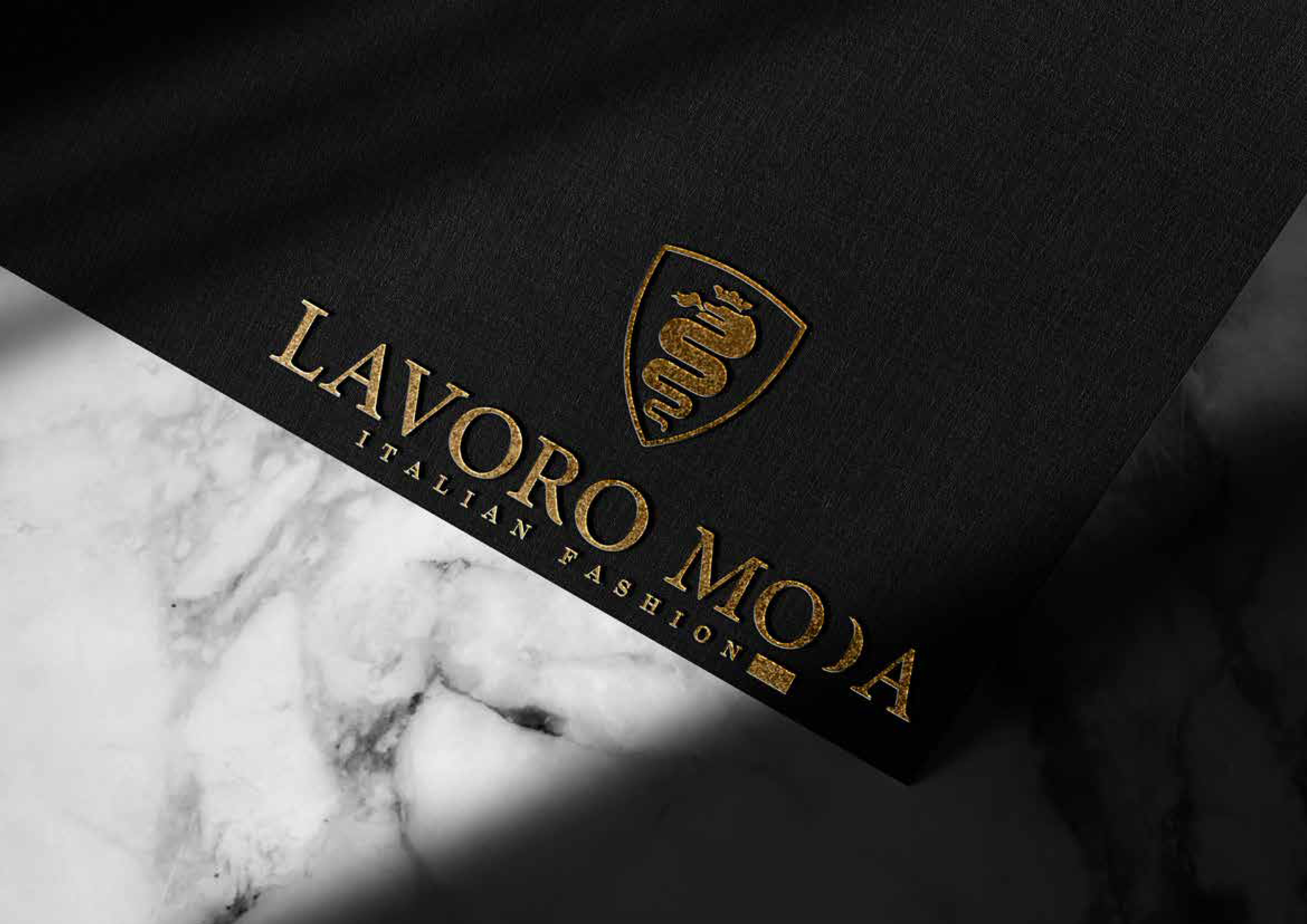 Lavoro Moda fashion packaging showing hang tag, box and tissue paper with brand identity applied